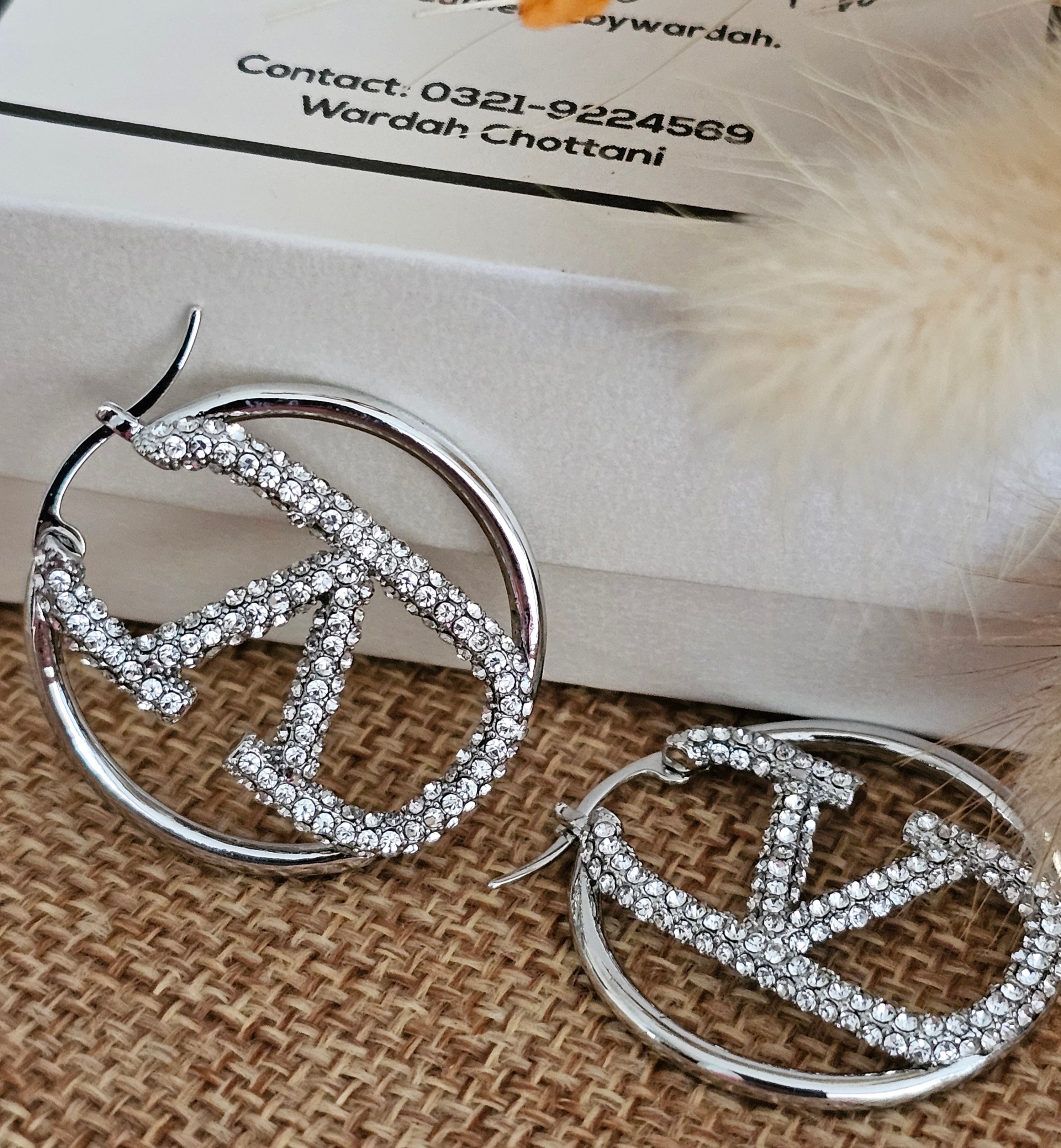 Silver hoops with Valentino logo