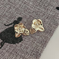 Chanel gold/flower tops
