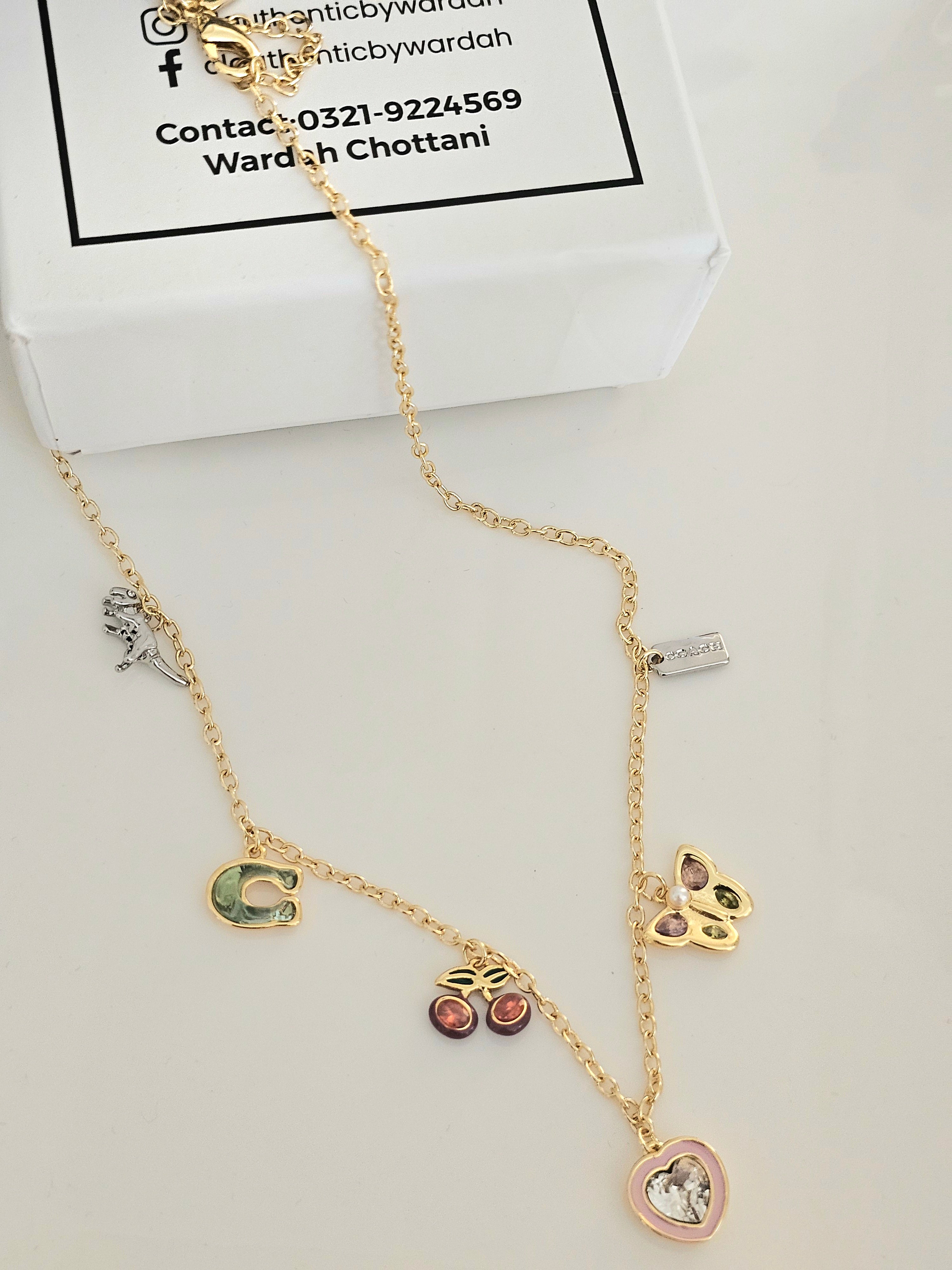 Coach dangling necklace