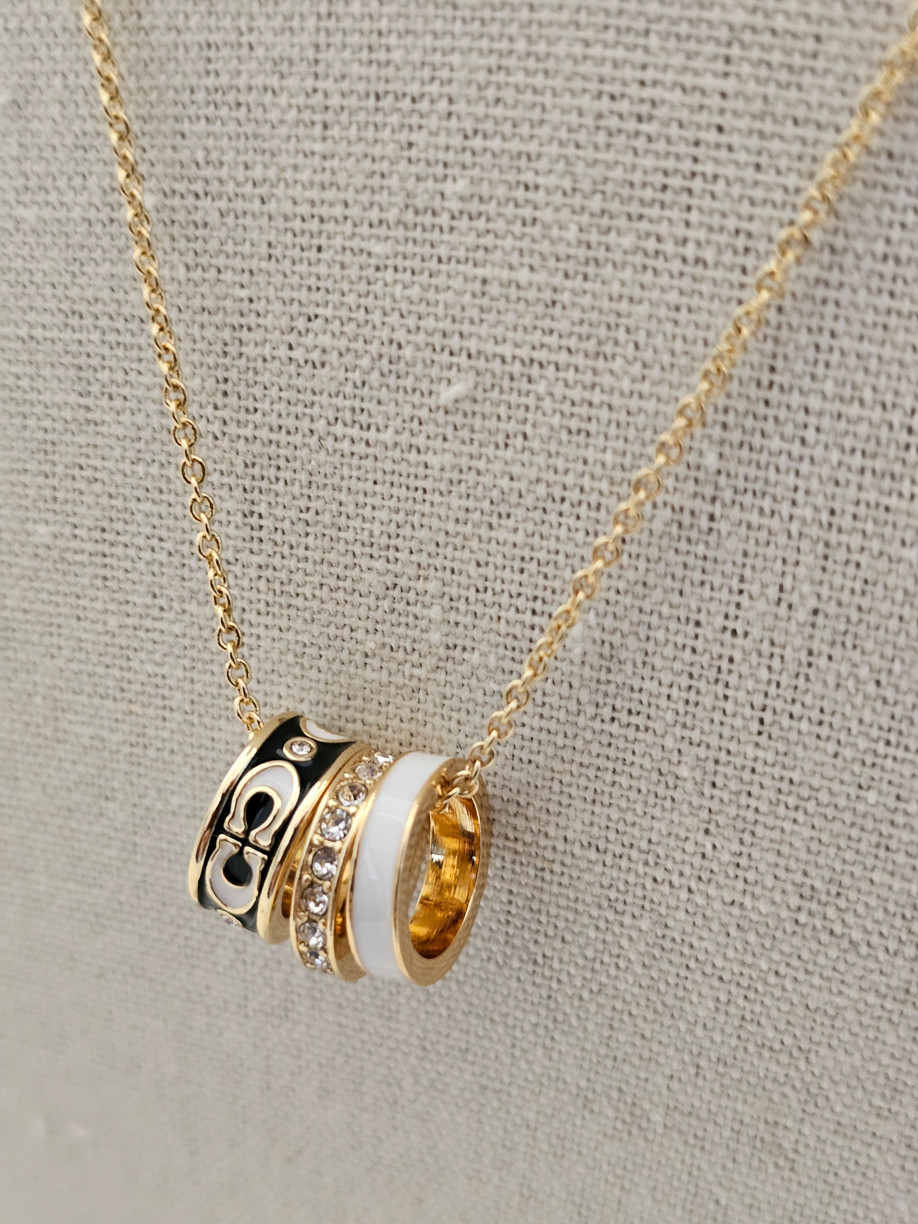 Coach ring necklace