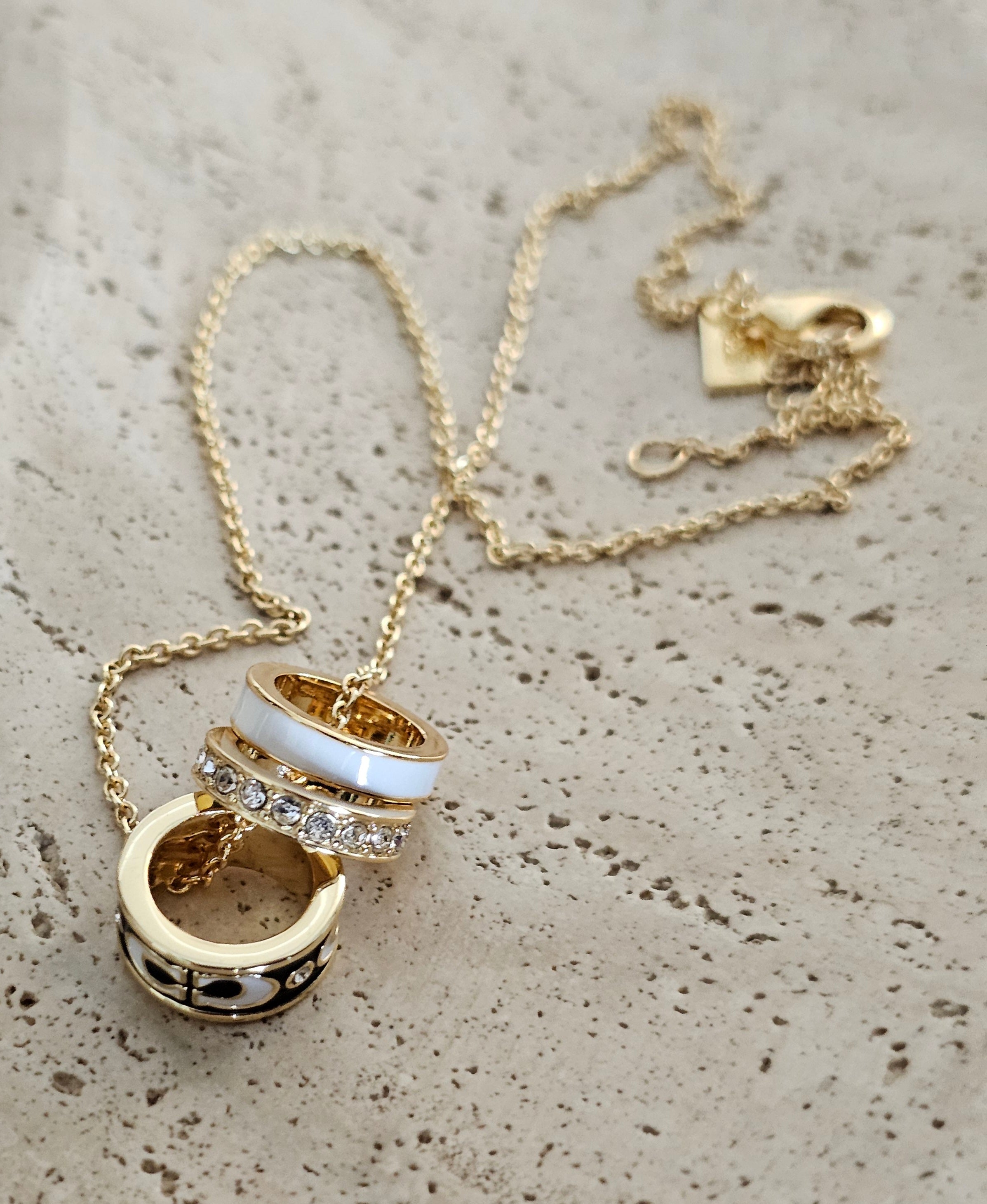 Coach ring necklace