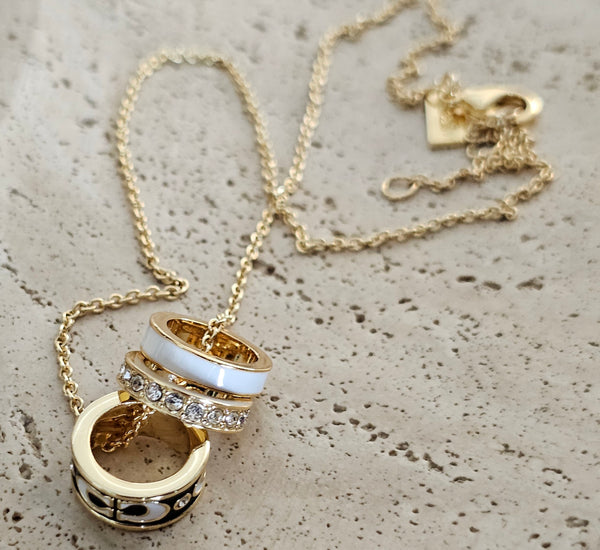 Coach ring necklace