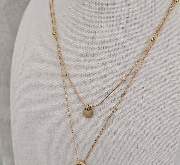 Gold necklace with tiny balls