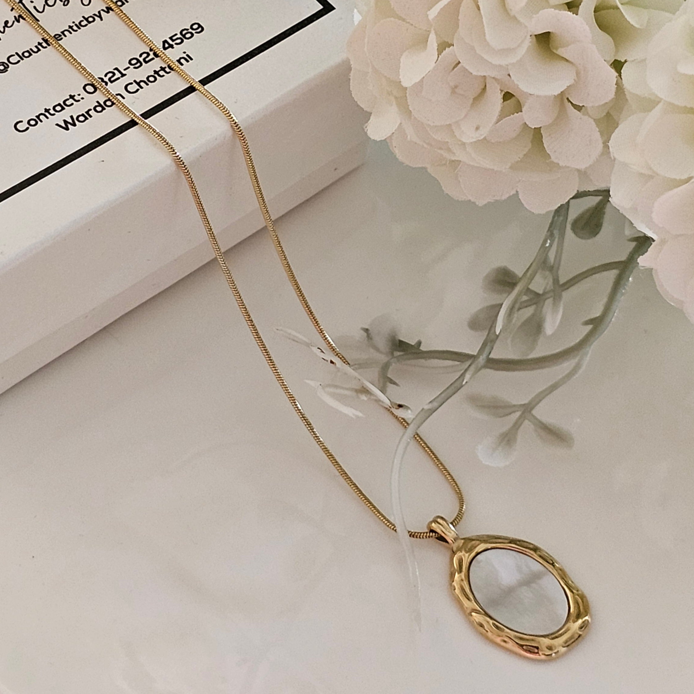 Oval mirror style necklace