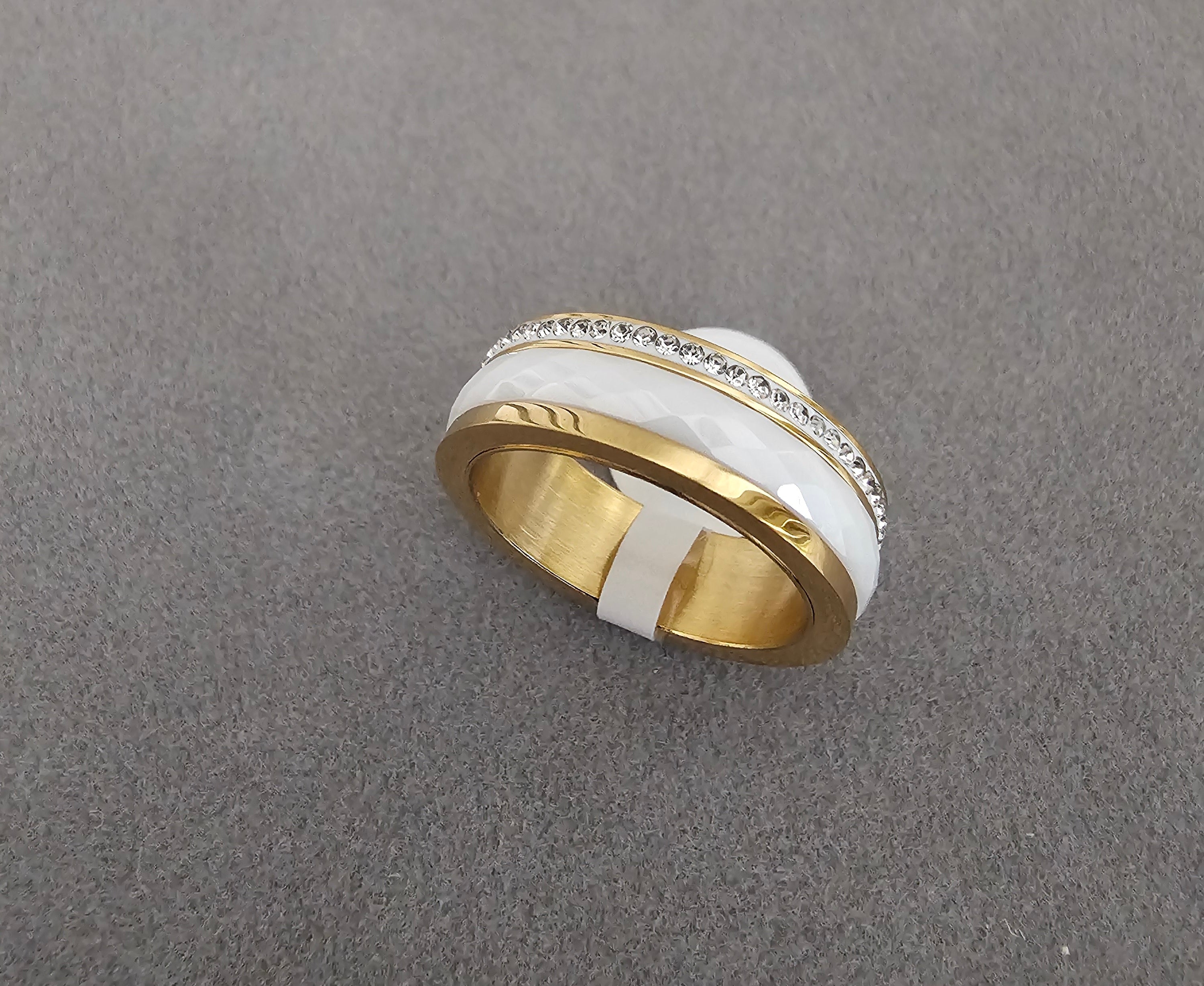 White/gold band with zircons