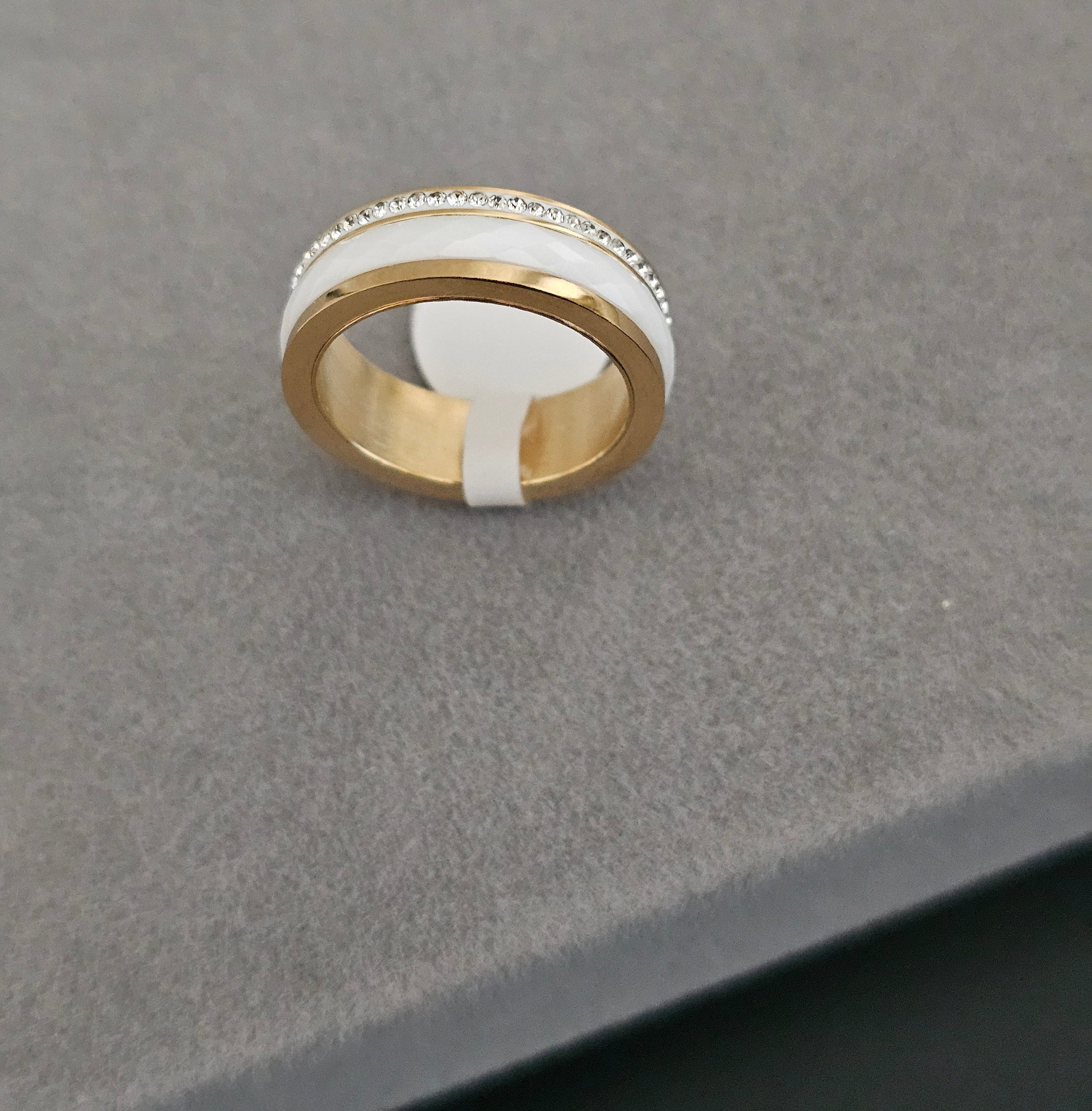 White/gold band with zircons