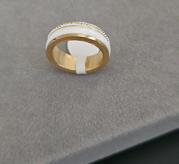 White/gold band with zircons