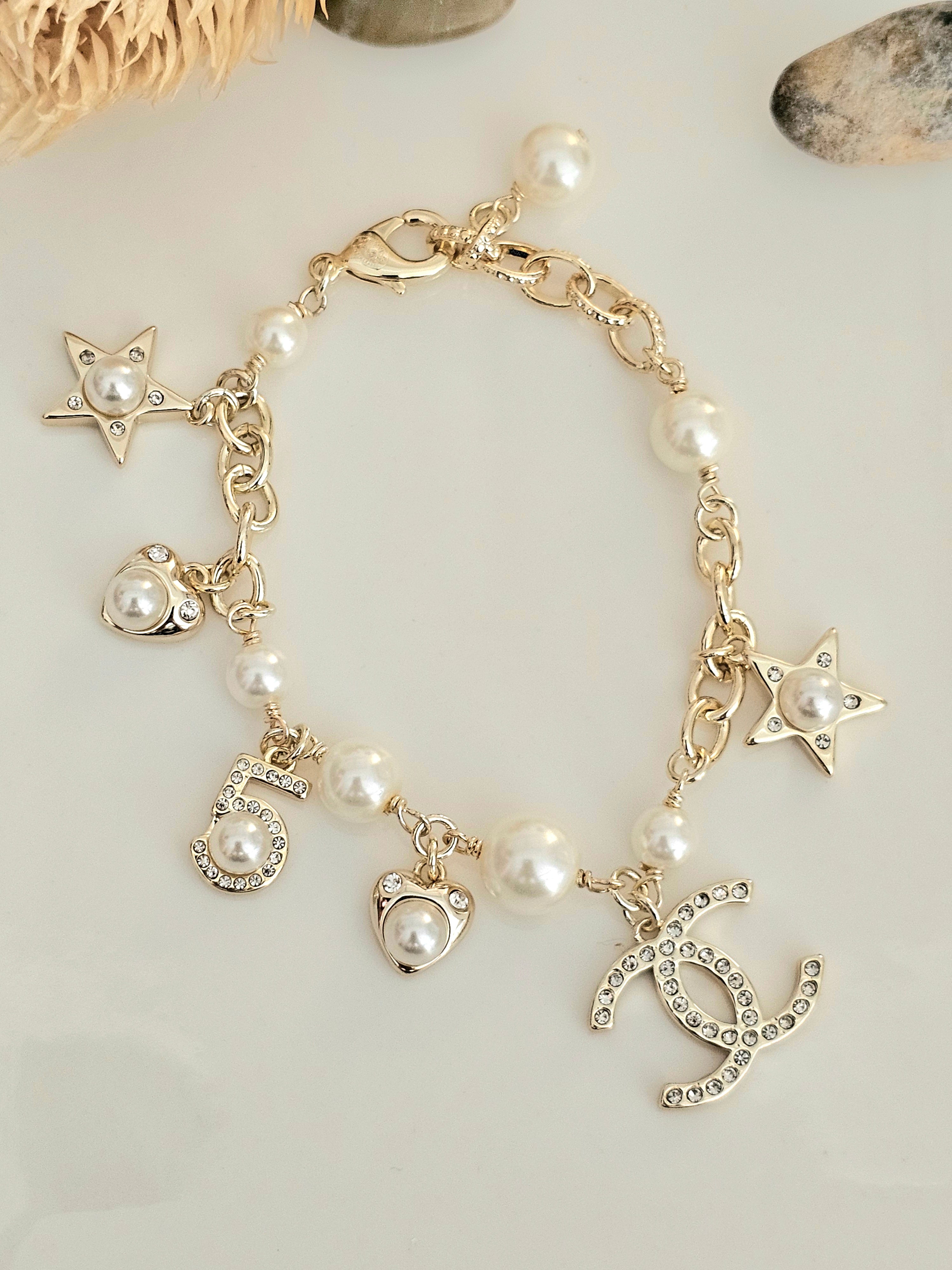 Chanel pearl and star bracelet