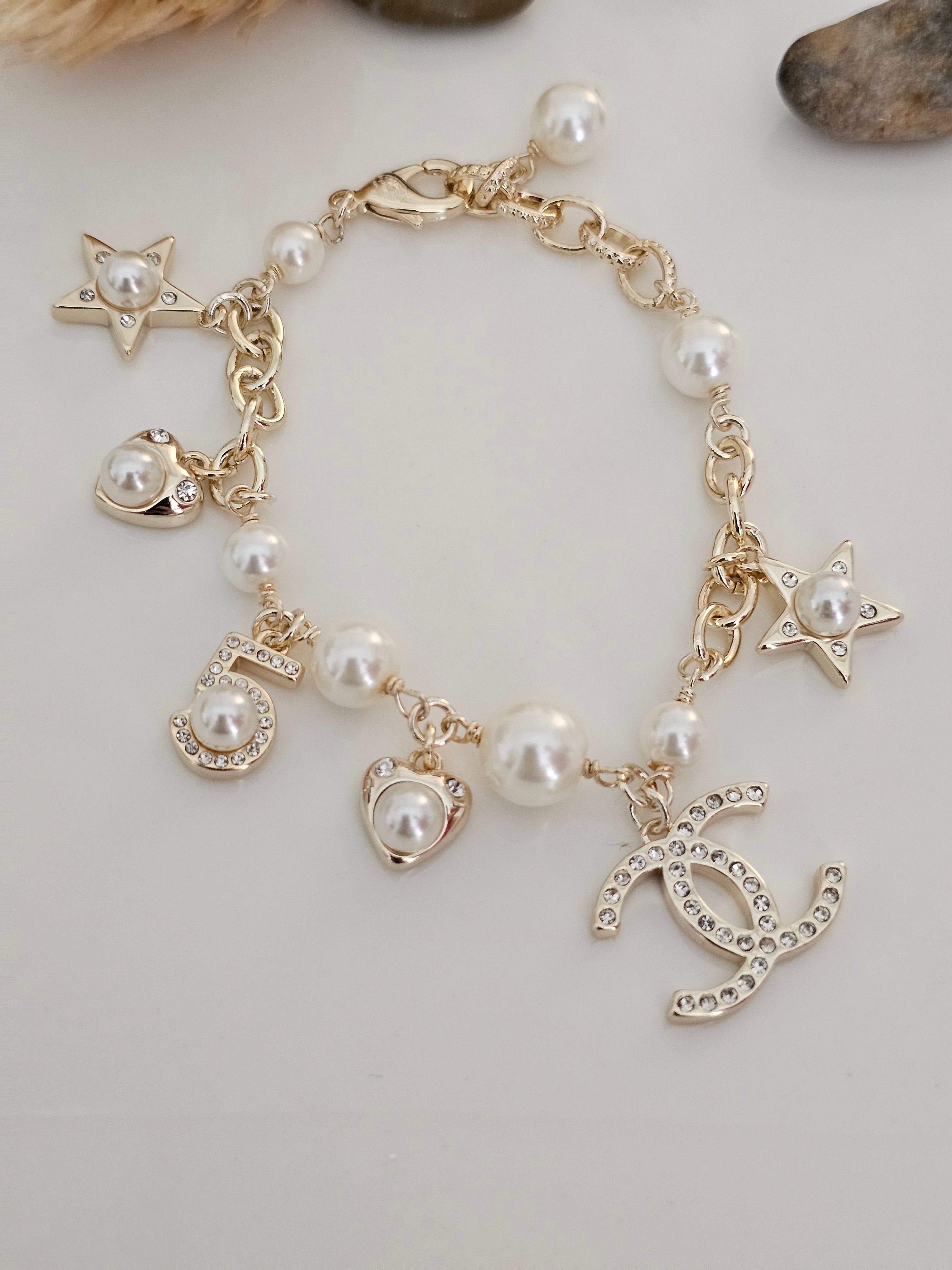 Chanel pearl and star bracelet