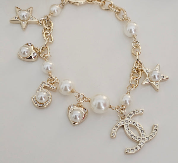 Chanel pearl and star bracelet