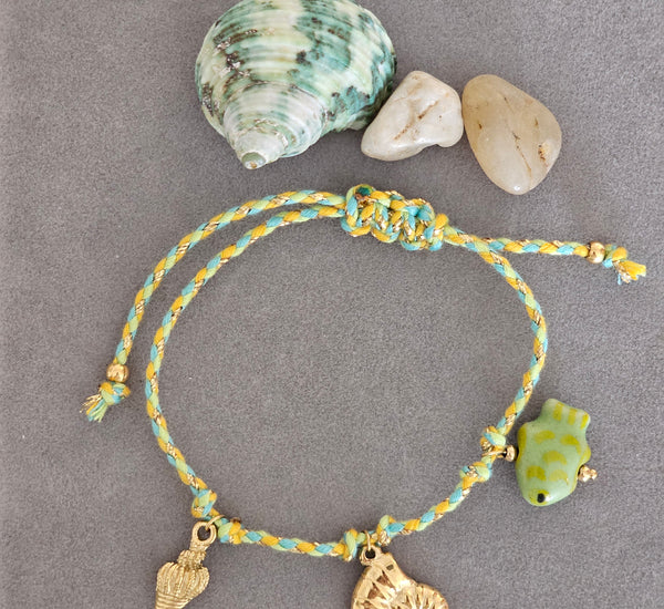 Green multi thread bracelet